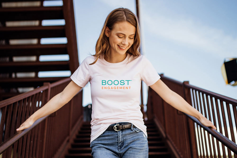 Woman wearing Boost Engagement shirt apparel branded merchandise