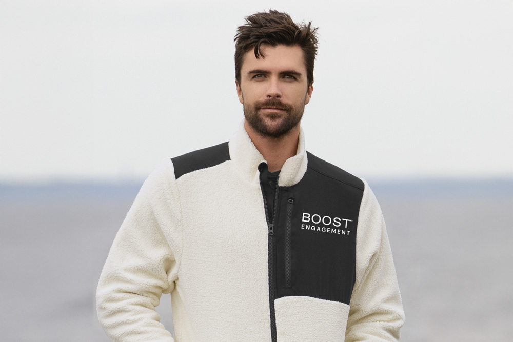 Man wearing Boost Engagement branded sherpa jacket