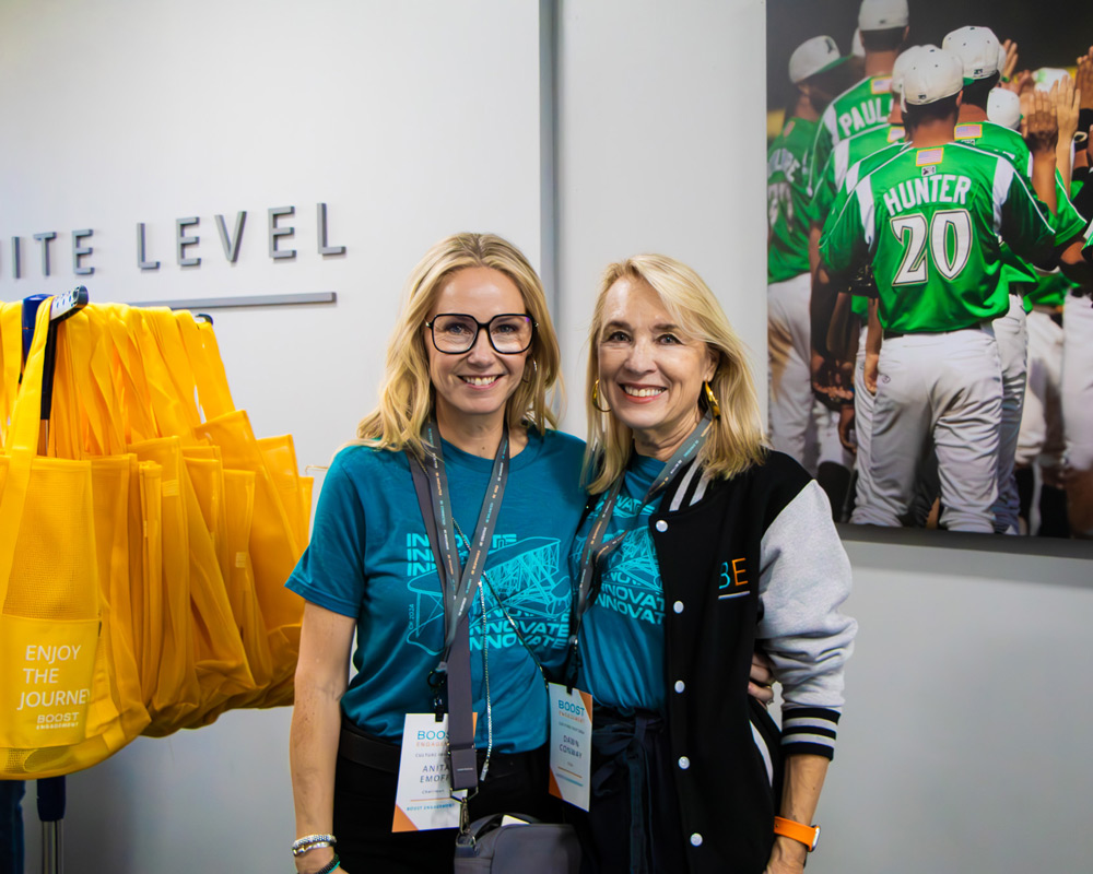 Anita and Dawn, two women, smiling for picture in Dayton Dragons Suite Level