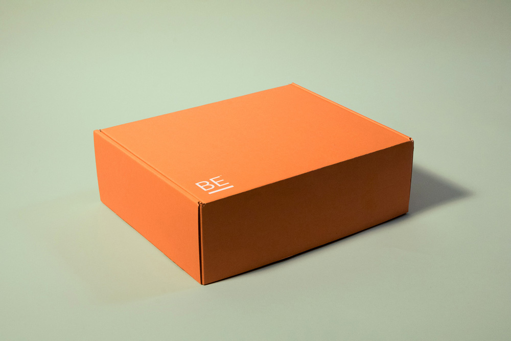 Boost Engagement branded onboarding kit box