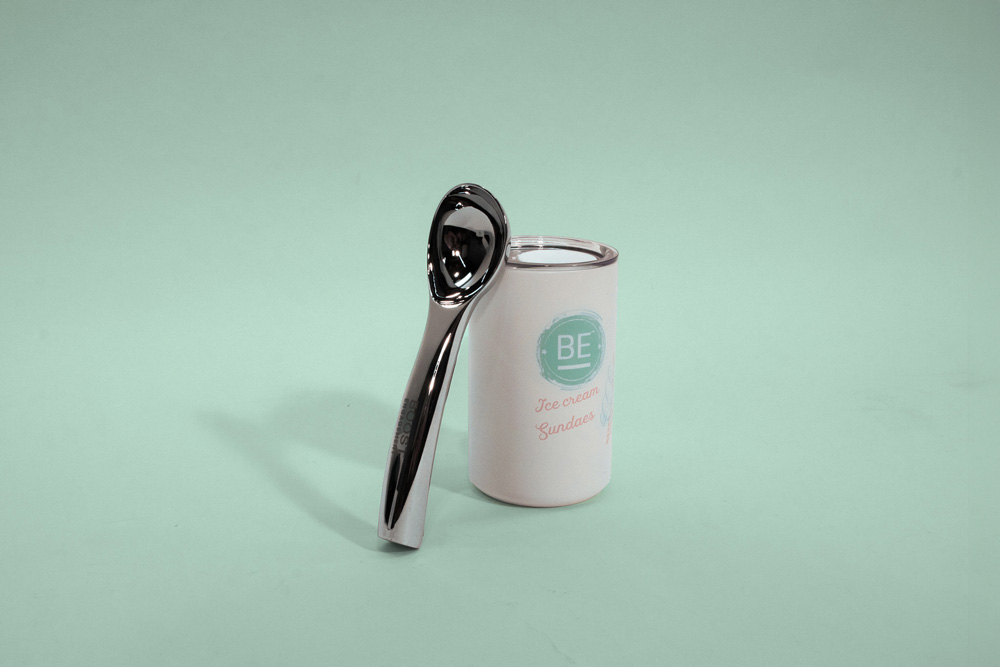 Boost Engagement branded ice cream scooper and tumbler