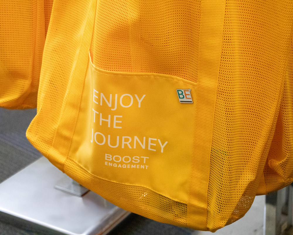 Yellow Boost tote bag that says Enjoy the Journey